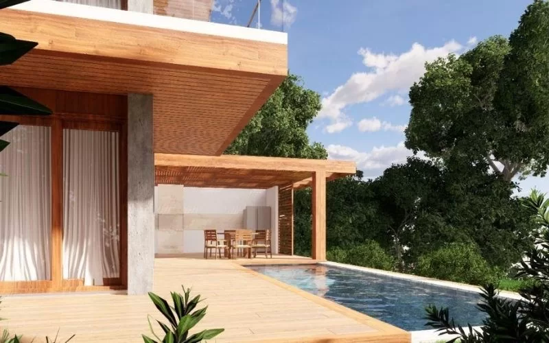 Casa moderna com piscina e varanda de madeira.