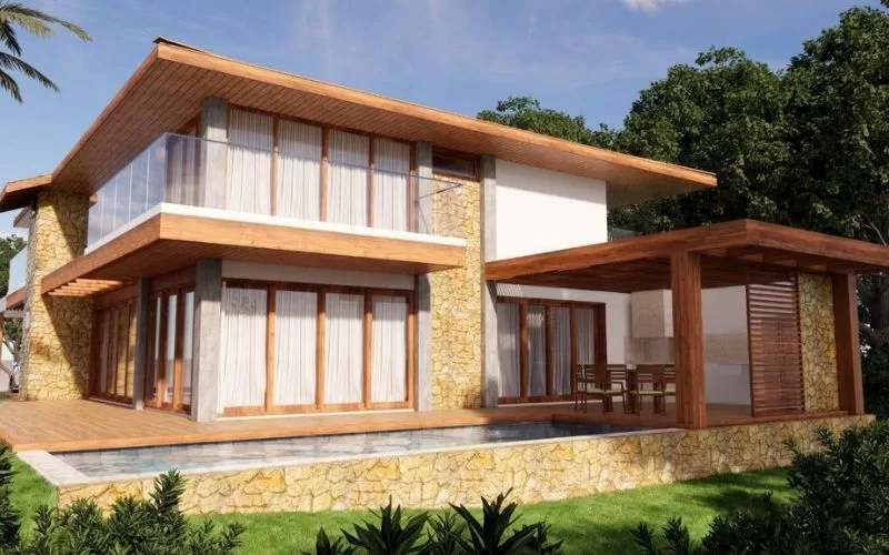 Casa moderna com pedra e madeira ao ar livre.